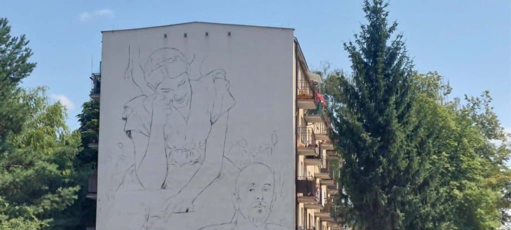Kolejny mural z dziełem Jacka Malczewskiego w Radomiu. „Autoportret z aniołem na tle łąki” powstaje przy ul. Kusocińskiego